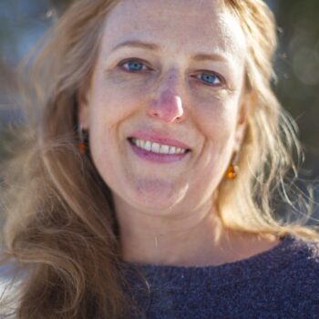 Una Drake smiling in sun